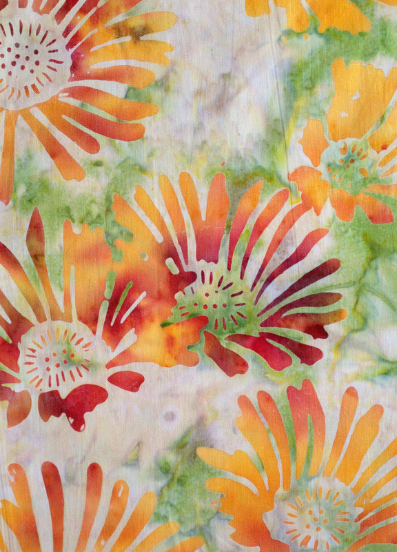 A close-up of a watercolor floral pattern featuring orange, red, yellow, and green painted flower shapes on a light textured background.
